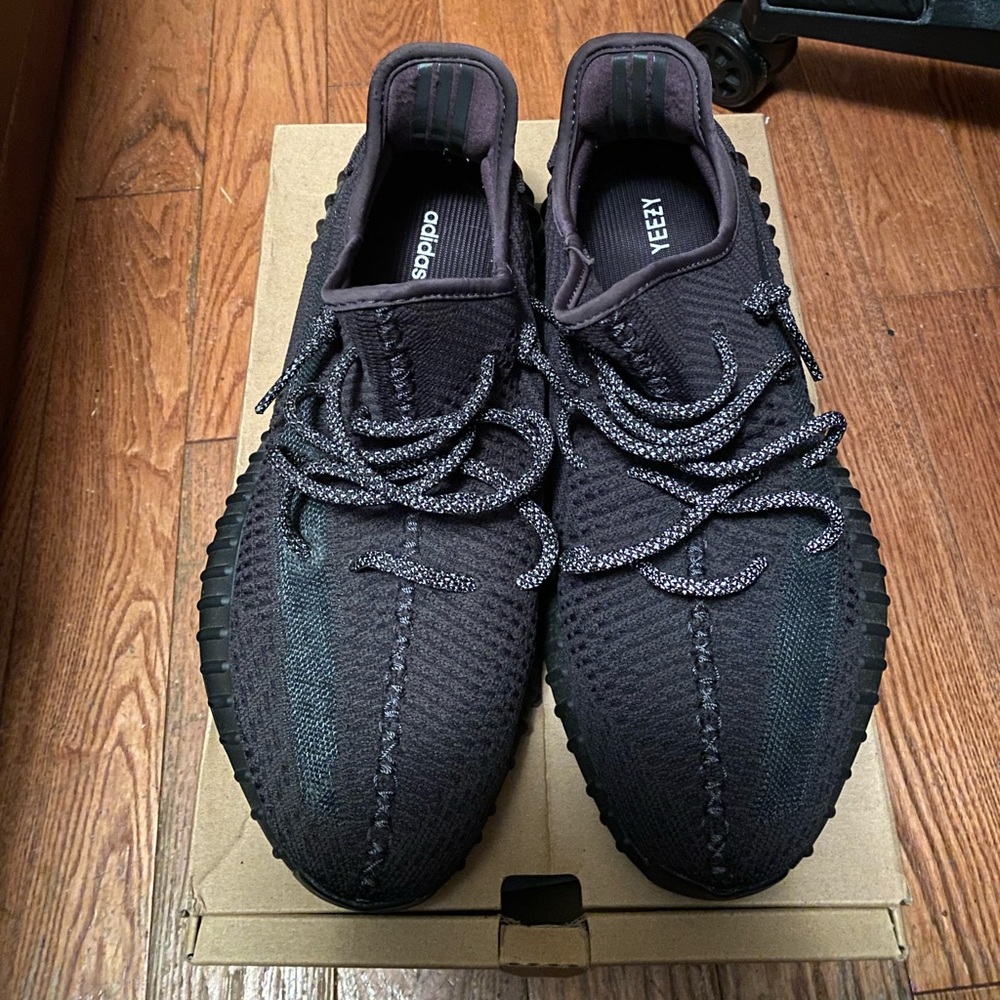 Yeezy 350 black non reflective. Laces flash with pac three and other parts.